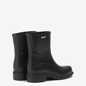 Black rubber boots with Aigle logo on a white background