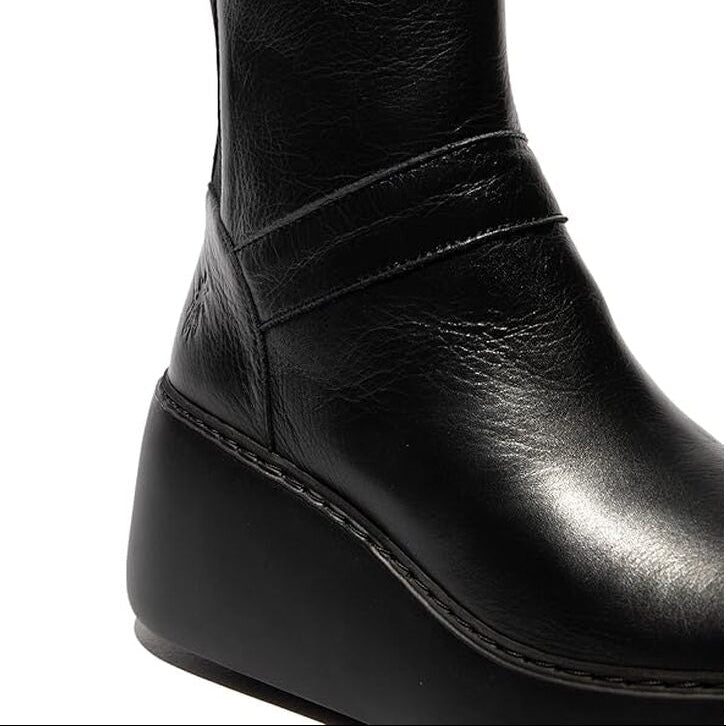 Black leather ankle boot on a white background