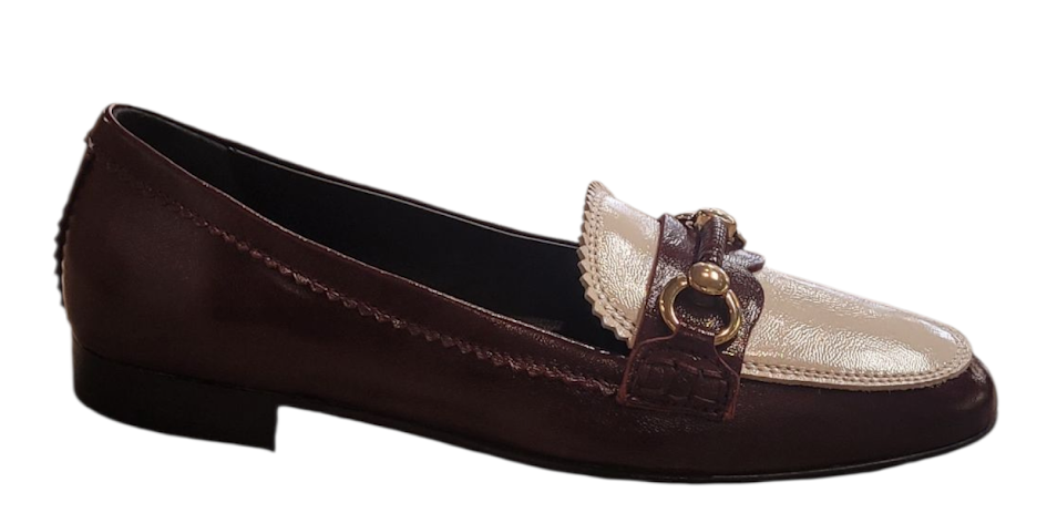 Burgundy loafer with gold buckle on a white background