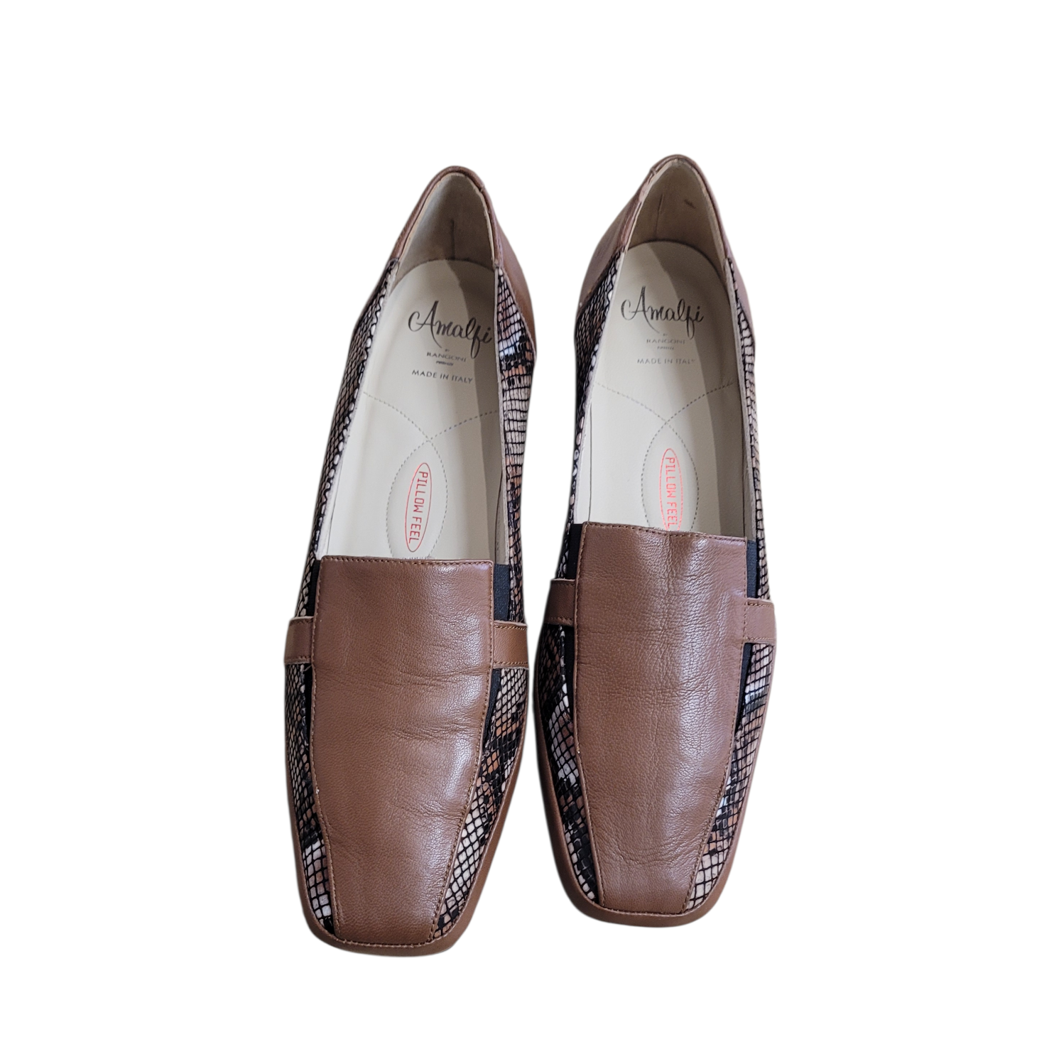 Pair of brown loafers with patterned insole on a white background