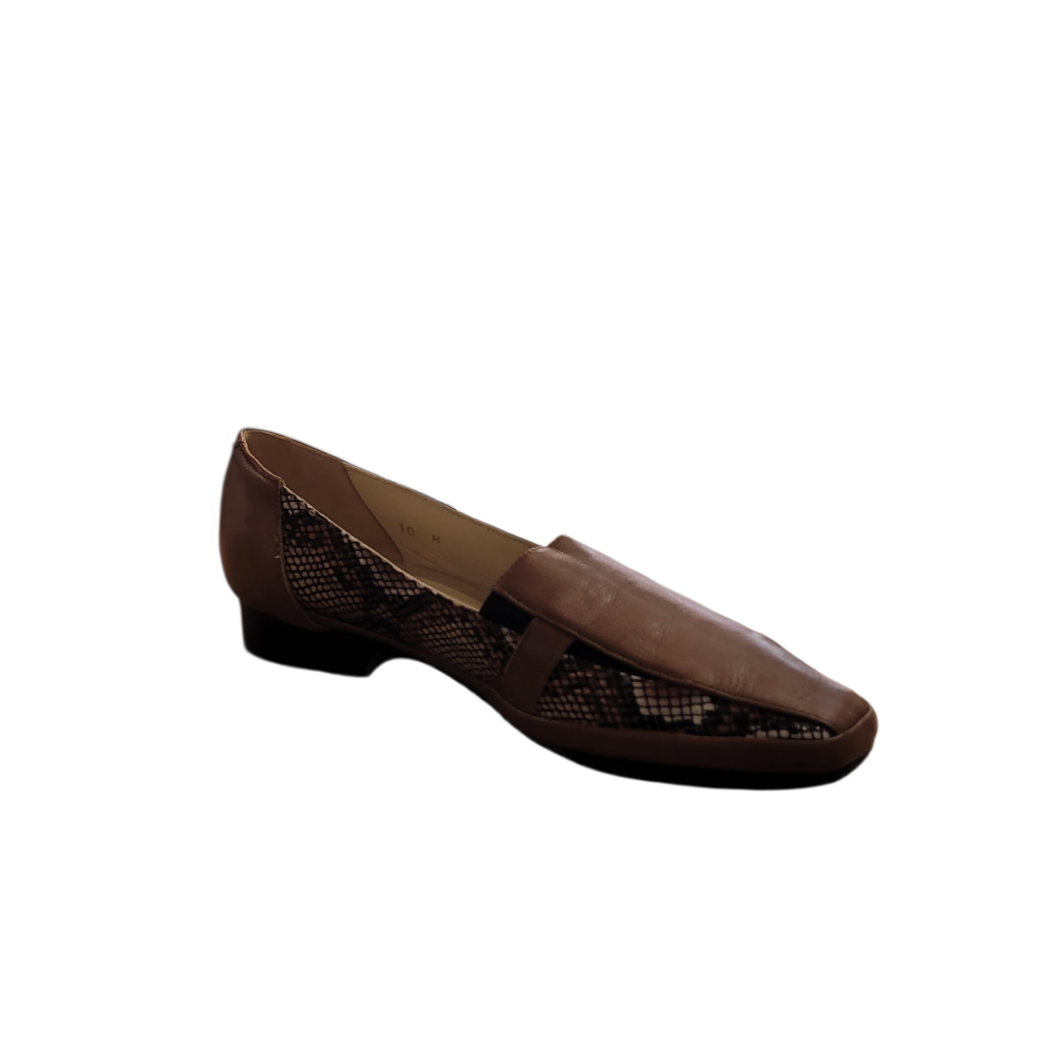 Brown leather loafer on a white background
