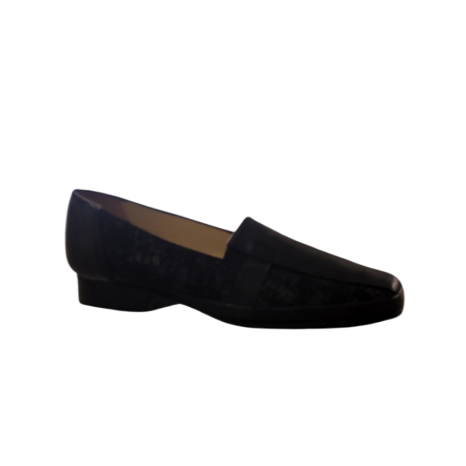 Black loafer shoe on a white background