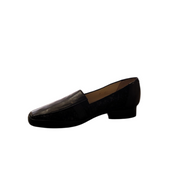 Black loafter with a white background