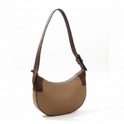 Brown shoulder bag with a strap on a white background