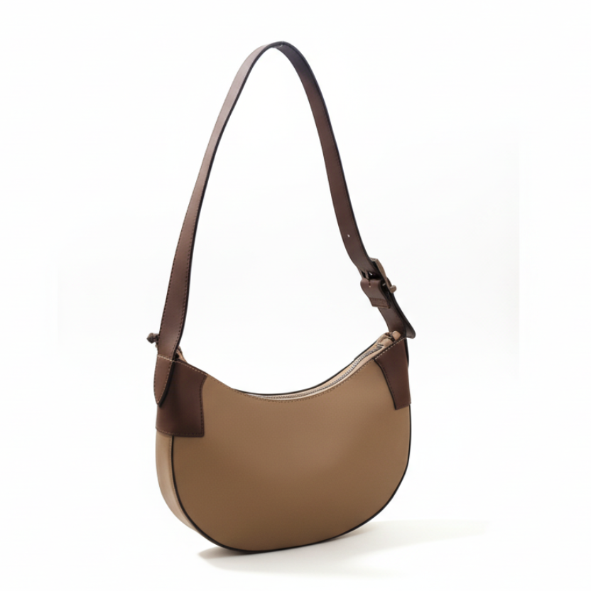 Brown shoulder bag with a strap on a white background