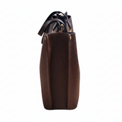 Brown leather handbag with a strap on a white background