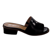 Black patent leather sandal with a block heel on a white background