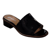 Black patent leather sandal on a white background