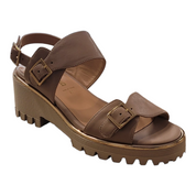 Beige sandal with platform sole on a white background