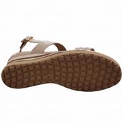 Sandal with textured sole on a white background