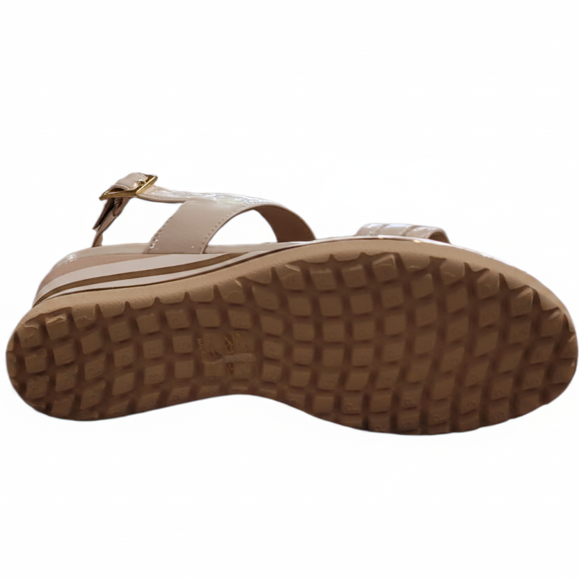 Sandal with textured sole on a white background