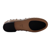 Close-up of a shoe sole with 'Geox' branding on a white background