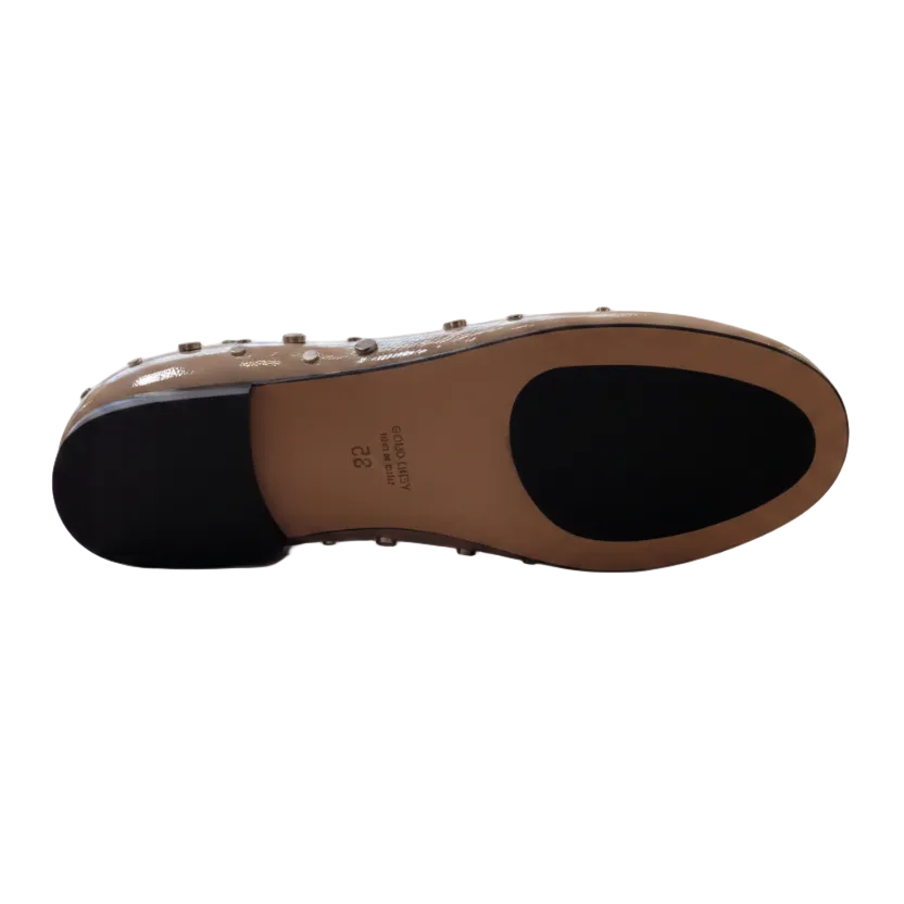Close-up of a shoe sole with 'Geox' branding on a white background