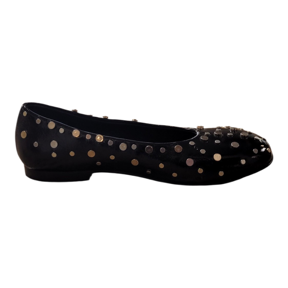 Black flat shoe with gold polka dots on a white background