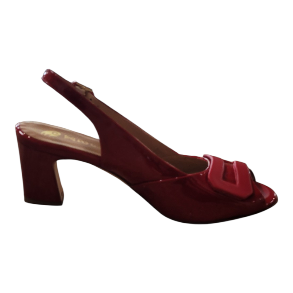 Red high-heeled shoe on a white background