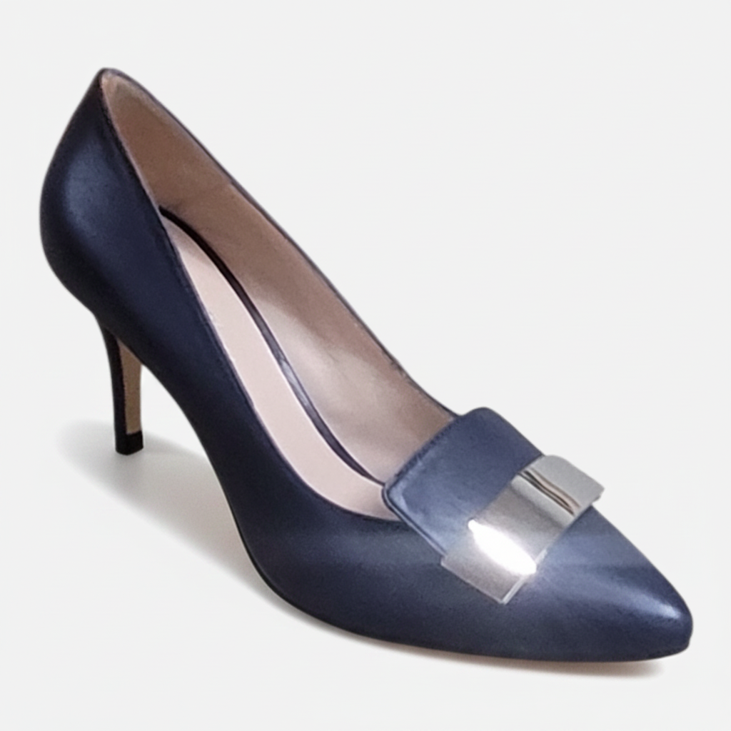 Navy blue high-heeled shoe with a silver buckle on a white background