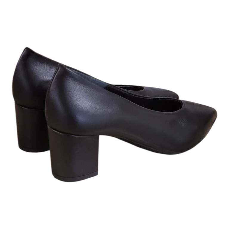 A pair of black leather block-heel pumps with a rounded toe, shown from a side profile view against a plain white background.
