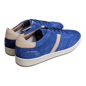 A pair of blue suede Jackal sneakers with beige side stripes, beige heel tabs, and white soles, shown on a plain white background.