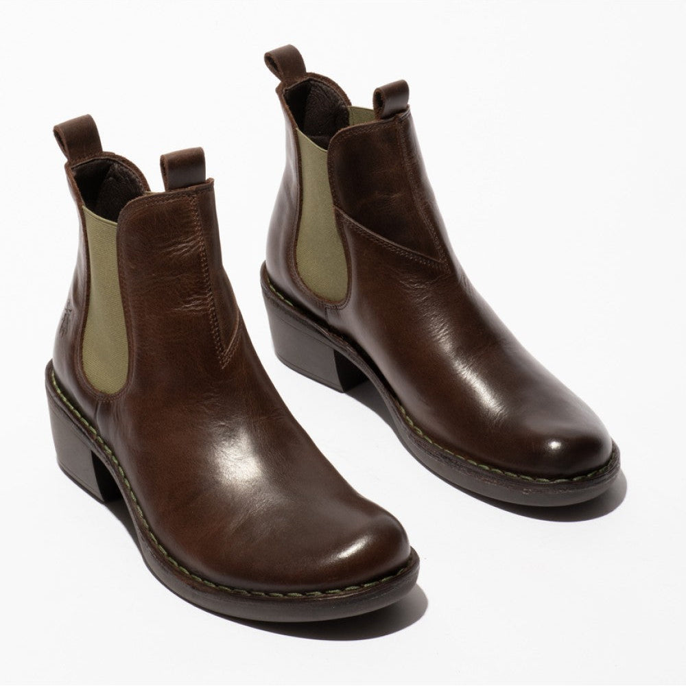 Pair of brown leather Chelsea boots on a white background