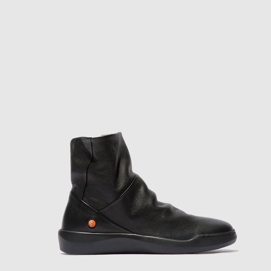 Black leather boot on a white background