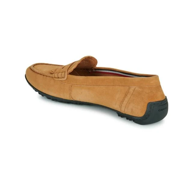 Tan loafer shoe on a white background