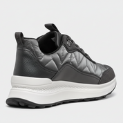 Gray quilted sneaker with white sole on a white background