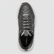 Gray sneaker with lace-up design on a white background