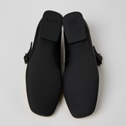 Black shoes with a white background