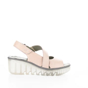 Pink sandal with a thick sole on a white background