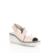 Pink sandal with a white sole on a white background
