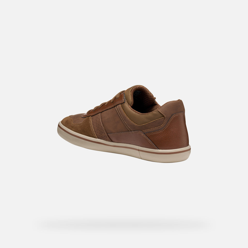 Brown sneaker on a white background