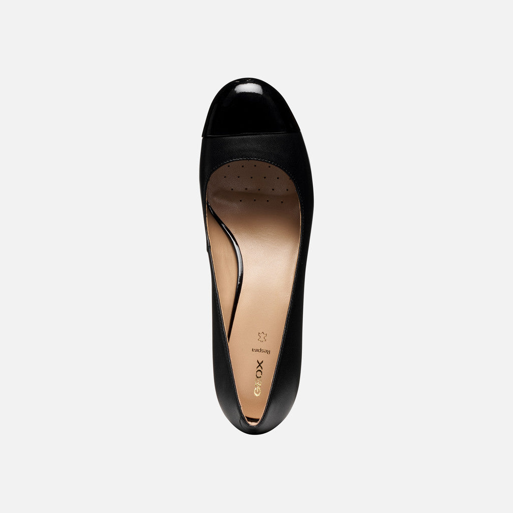Black high-heeled shoe on a white background