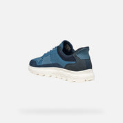 Blue athletic shoe on a white background