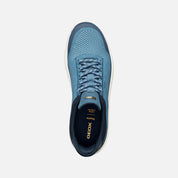 Blue sneaker with Geox branding on a white background