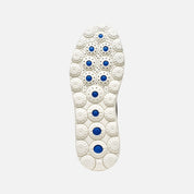 White shoe sole with blue accents on a light gray background