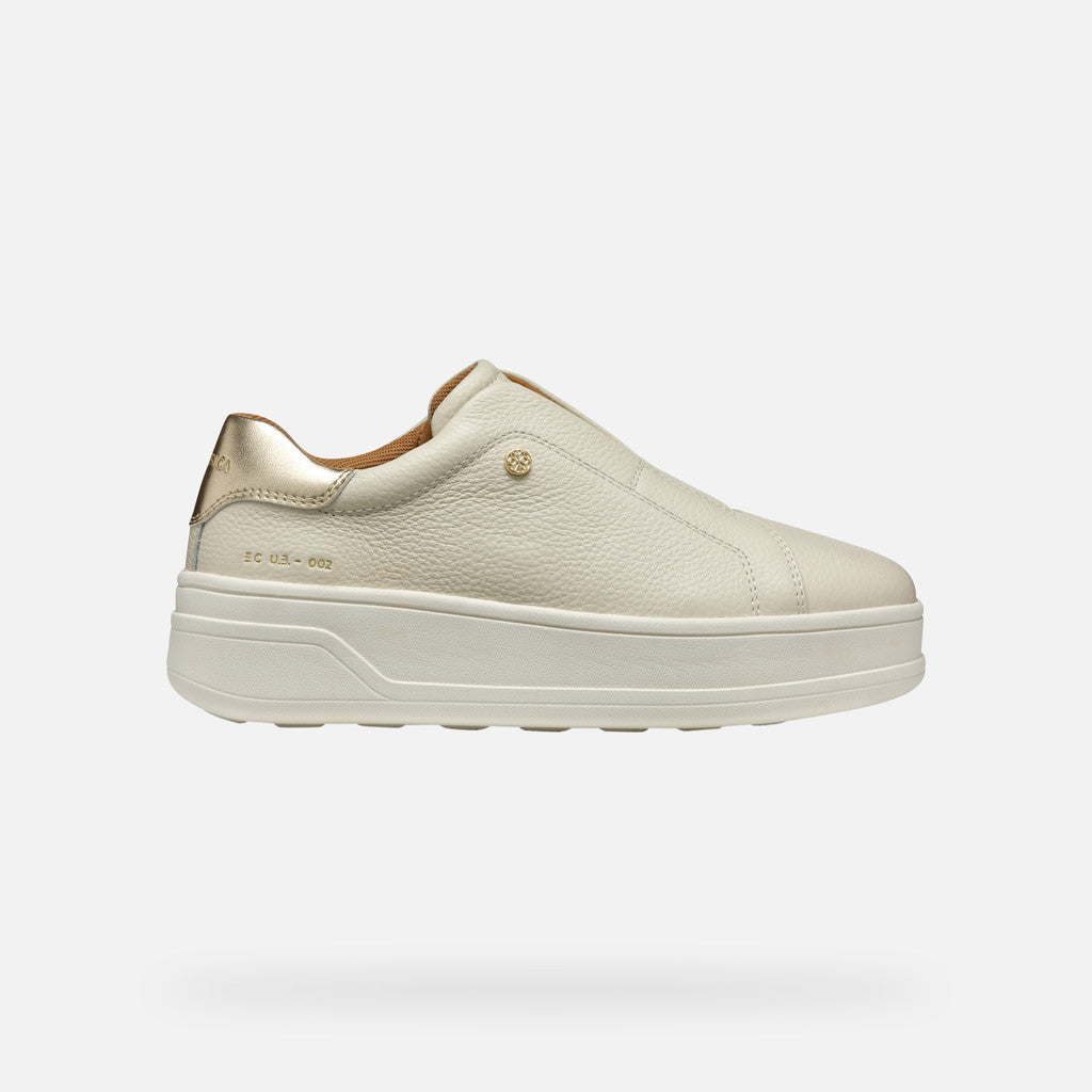 Beige sneaker with a platform sole on a white background