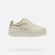 Beige sneaker with a platform sole on a white background
