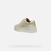 Beige sneaker on a white background