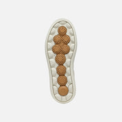 Foot sole with textured design on a light gray background