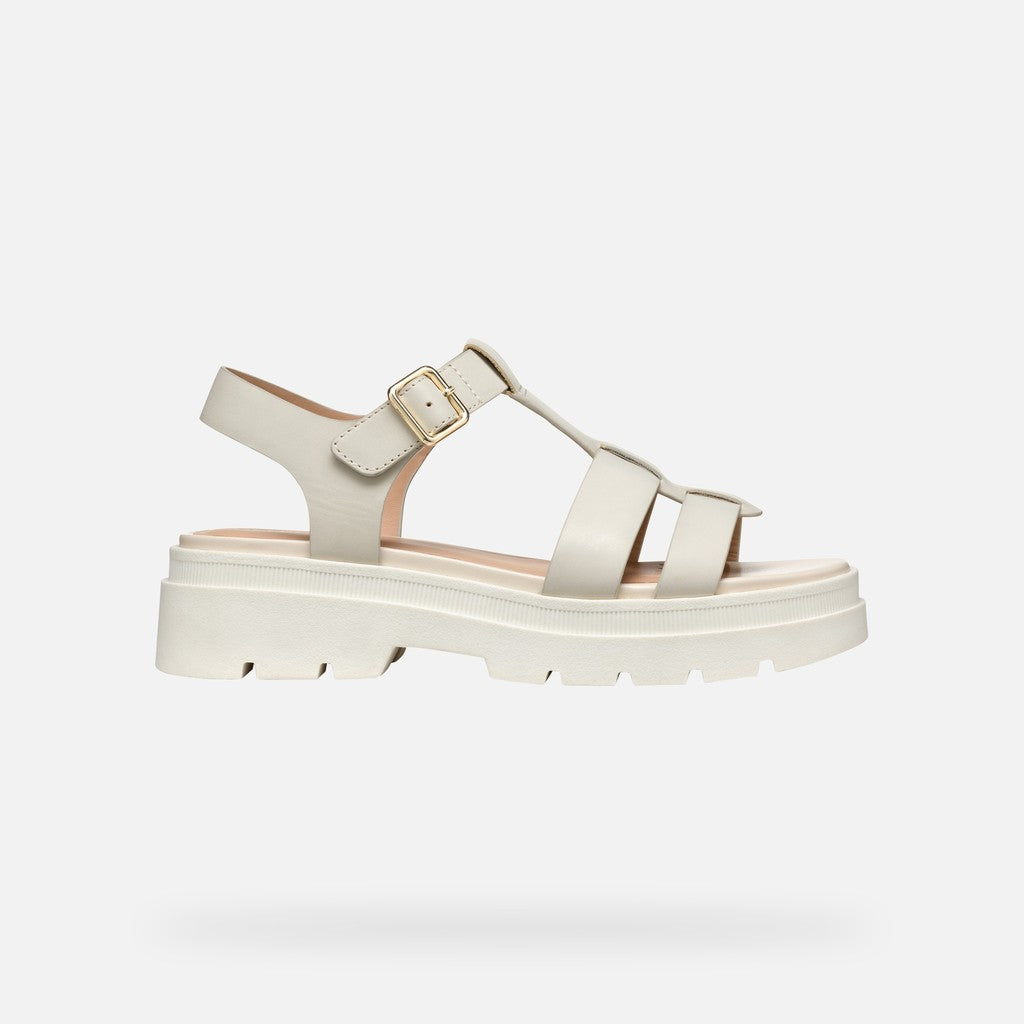 cream sandal with a platform sole on a light gray background