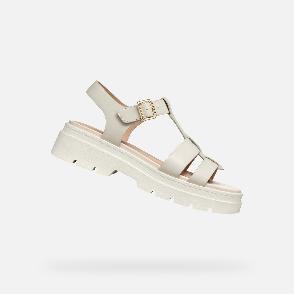 Cream sandal with a platform sole on a white background
