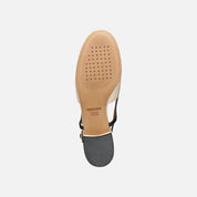Close-up of a sandal sole with Geox branding on a white background