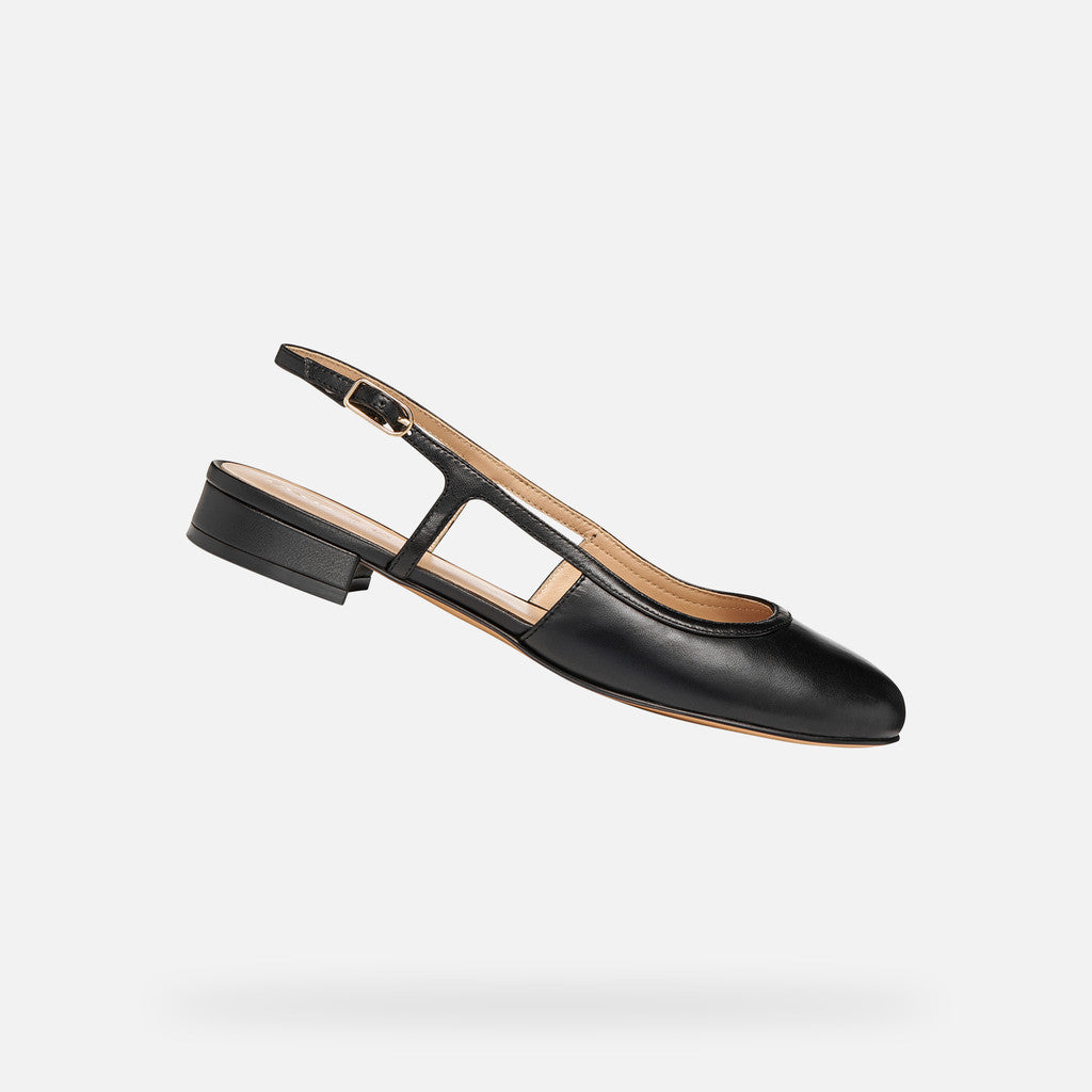 Black slingback shoe on a light gray background