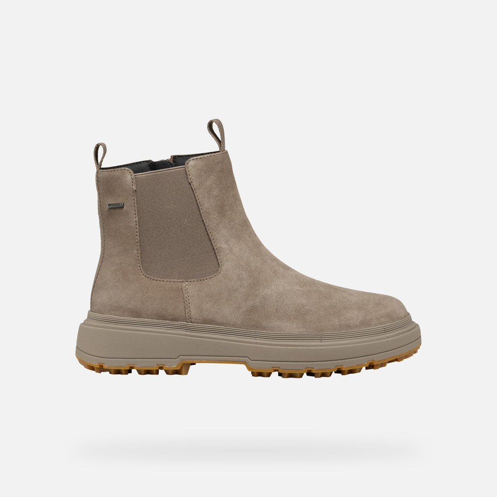 Beige Chelsea boot on a white background