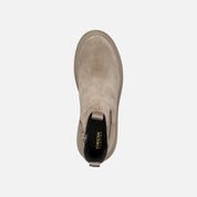 Taupe ankle boot with Geox branding on a white background