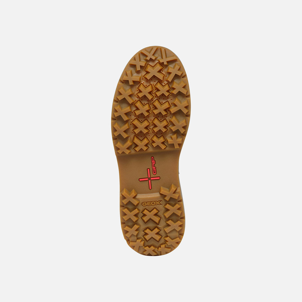 Shoe sole with a brand logo on a white background