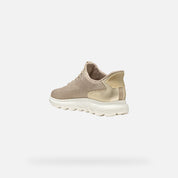 Beige sneaker on a white background