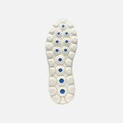 White shoe insole with blue accents on a light gray background