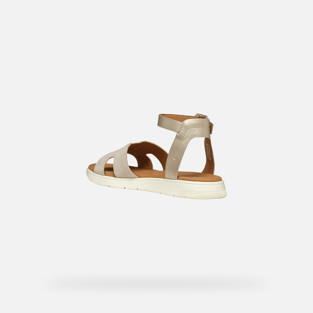 Beige sandal on a white background