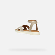 Beige sandal on a white background